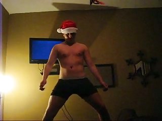 Amateur Gay In Santa Hat Dancing On A Bed