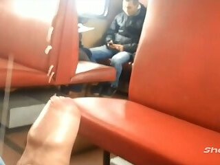 Cumming on a public train