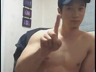 Korean guy showing his muscles and jerking off